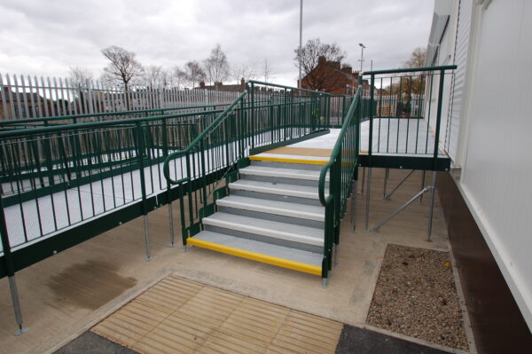 Image shows a green step unit