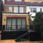 Image shows a step unit at the back of a house